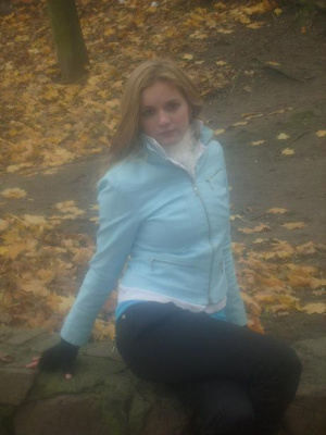 outerwear, jeans, sitting