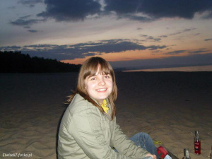 outerwear, fun, smile, sky, sitting, leisure, vacation
