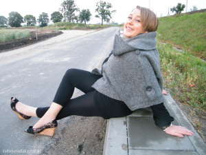 jacket, outerwear, jeans, sitting, shoe