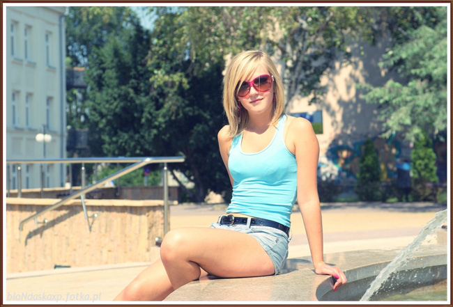 jeans, sitting, sunglasses