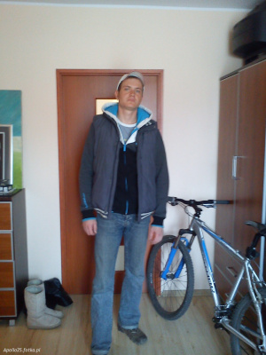 jacket, outerwear, jeans, standing, vehicle, bicycle, wheel