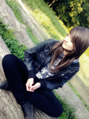 hair, hand, jacket, jeans, sitting