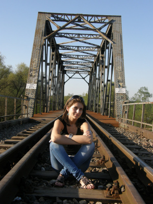 jeans, sitting, bridge, track
