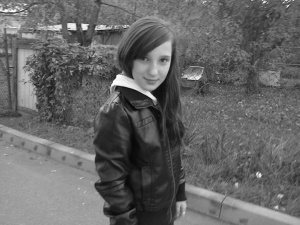 jacket, outerwear, smile, standing, monochrome