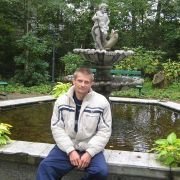 hand, jacket, outerwear, jeans, sitting