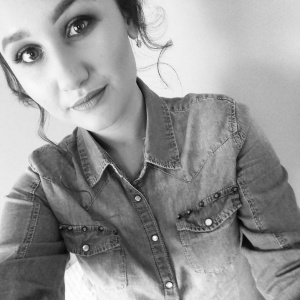 eyelash, skin, jacket, outerwear, jeans, smile, ear, monochrome