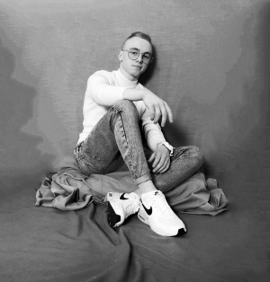 sitting, monochrome