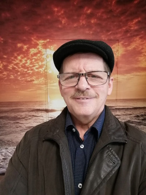 jacket, outerwear, smile, glasses, hat, tie
