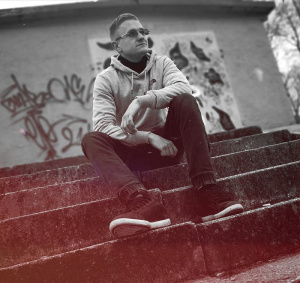 sitting, monochrome