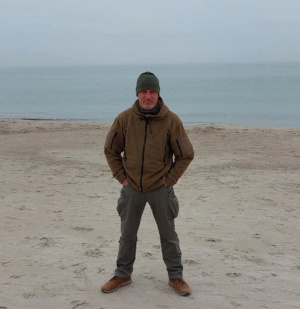 outerwear, vacation, standing, beach, sand